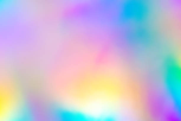 istock Blurry abstract iridescent holographic foil background. 1147871657