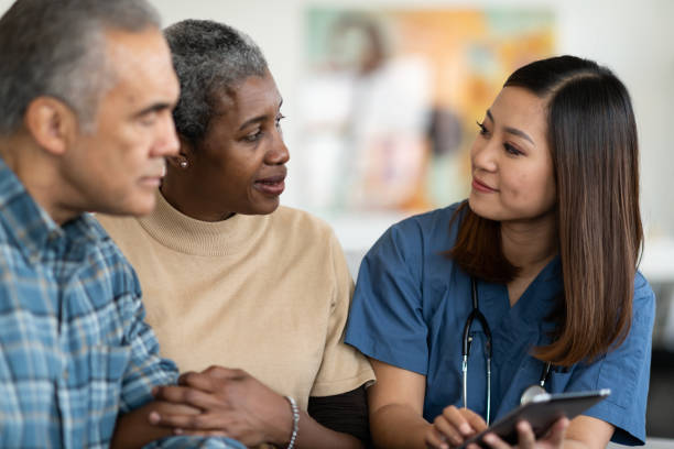 istock Sharing results with an elderly couple 1147874740