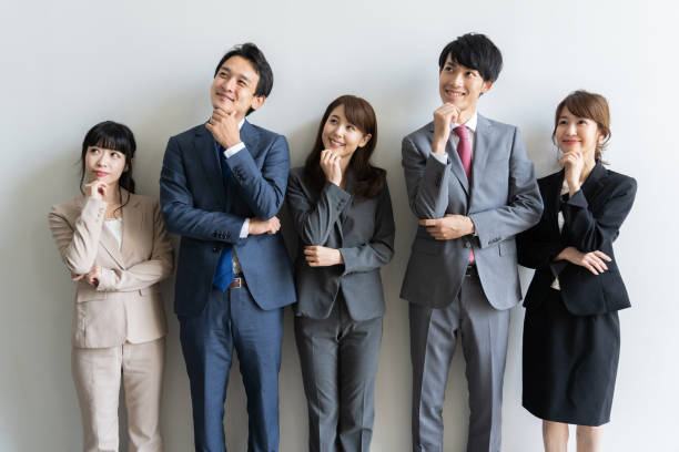istock portrait of asian business group standing 1147876759