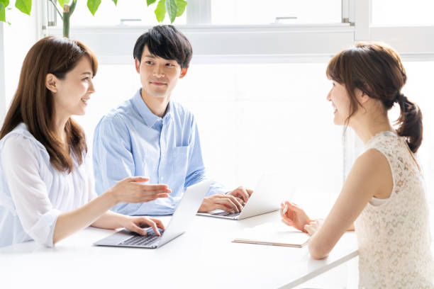 istock portrait of young asian group in office 1147879814