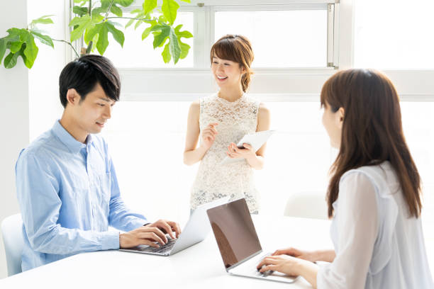 istock portrait of young asian group in office 1147879862