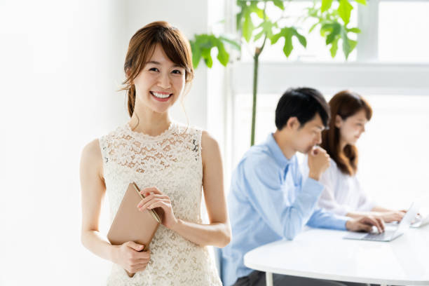 istock portrait of young asian group in office 1147879906