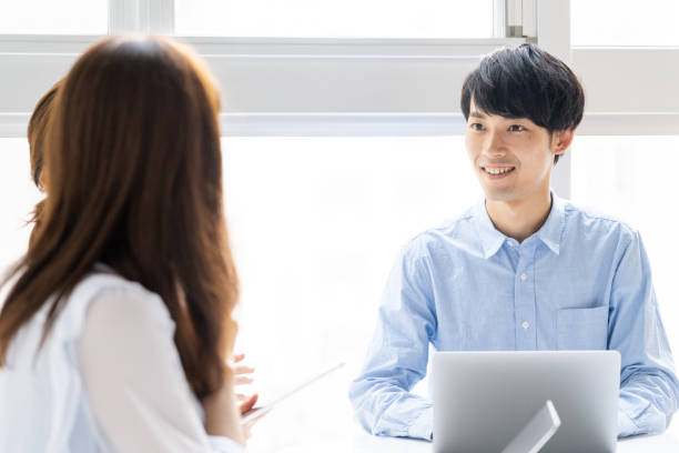 istock portrait of young asian group in office 1147880315