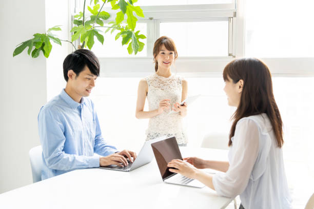 istock portrait of young asian group in office 1147880317