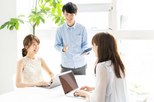 istock portrait of young asian group in office 1147880318