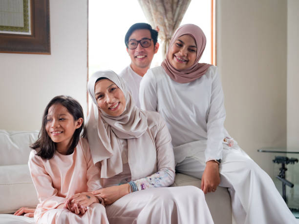 istock Small family laughing and talking 1147885757