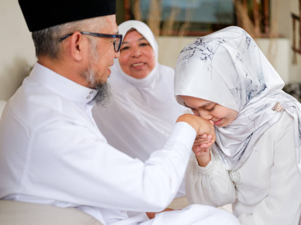 istock Daughter kiss father hand 1147887711