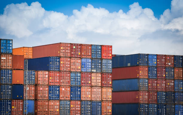 istock Container ship in export and import business and logistics in harbor industrial packing  and water transport 1147902470