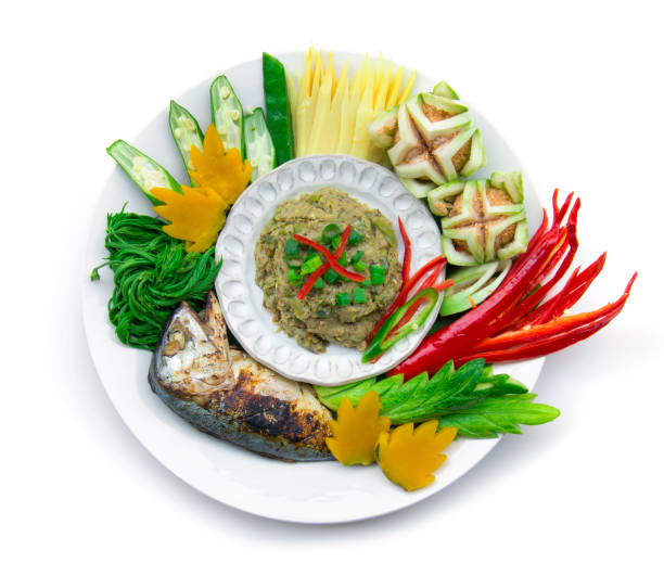 istock Fish mackerel dried paste chili spicy with fresh and boiled vagetable ,grill Thai mackerel.Thai cuisine,Thaispicy healthy food or dietfood top view  isolated on white background 1147910671