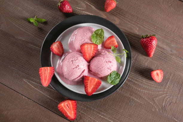 istock Fruit strawberry sorbet with fresh berries 1147910693