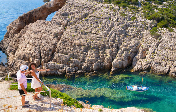 istock Couple hiking at the seaside Greece 1147913469