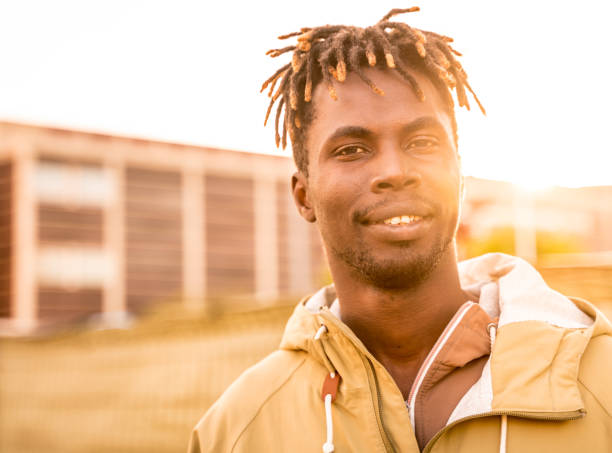 istock Young man in the city at sunset 1147913844
