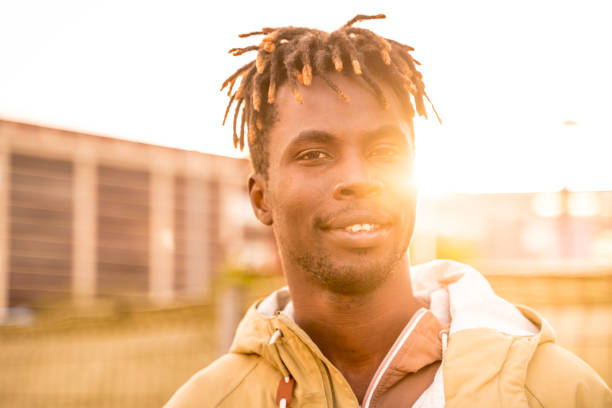 istock Young man in the city at sunset 1147913854