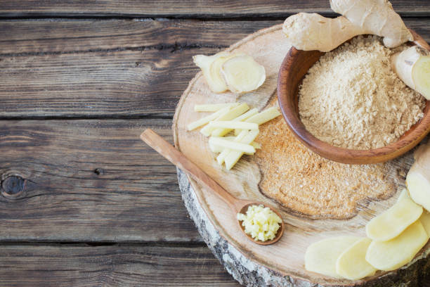 istock ginger on old wooden background 1147914753