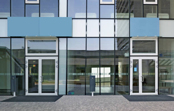 istock New glass windows and doors of a modern office building 1147919246