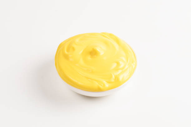 istock Cheese sauce in white plate on white background. 1147923313