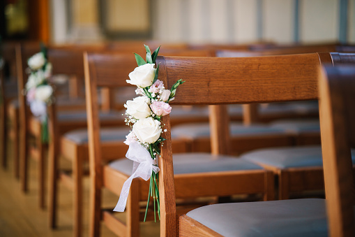 Aisle wedding ceremony flower decoration in church