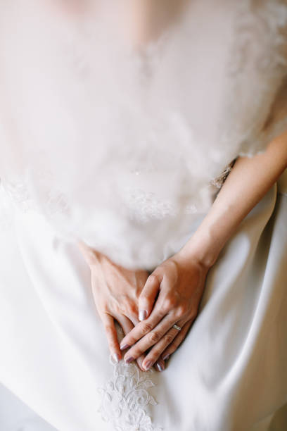 istock Bride dressed in white wedding gown waiting for bridegroom 1147923671
