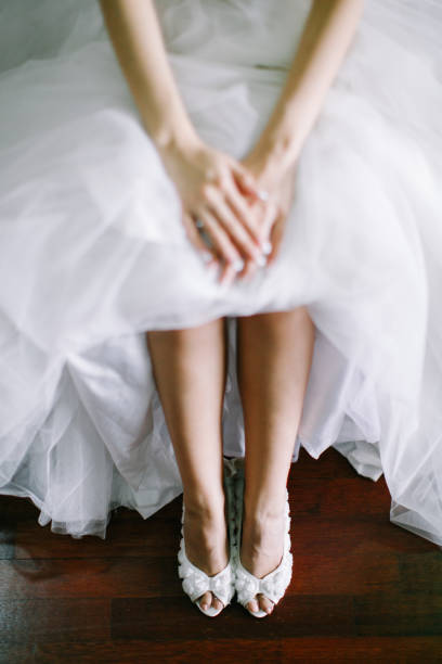 istock Bride dressed in white wedding gown waiting for bridegroom 1147923776