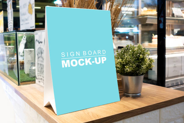 istock Mock up desktop stand signage tent in shop 1147927982