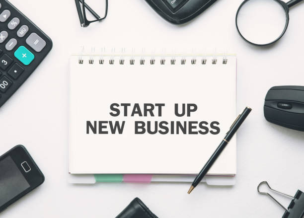 istock Start up new business text in notepad. Business concept 1147931068