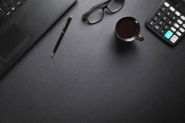 istock Black office desk. Business workplace 1147931091