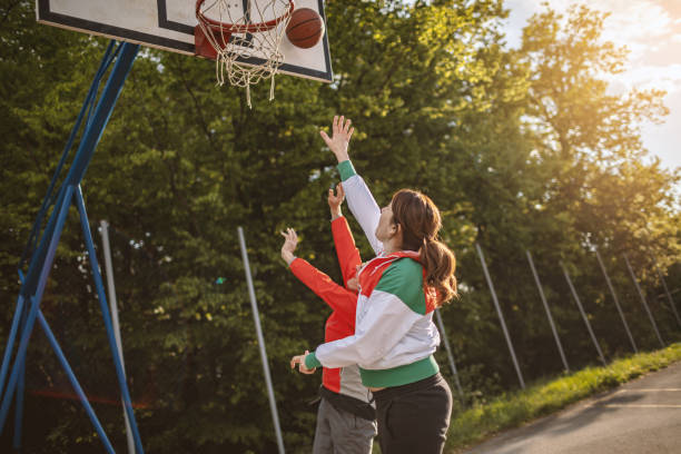 istock Active senior father and daughter playing basketball 1147932307