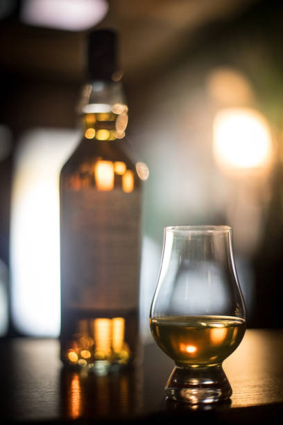 istock Glencairn whisky glass and bottle 1147932540