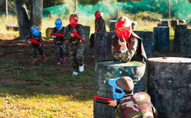 istock Teams of kids facing on battlefield 1147934433