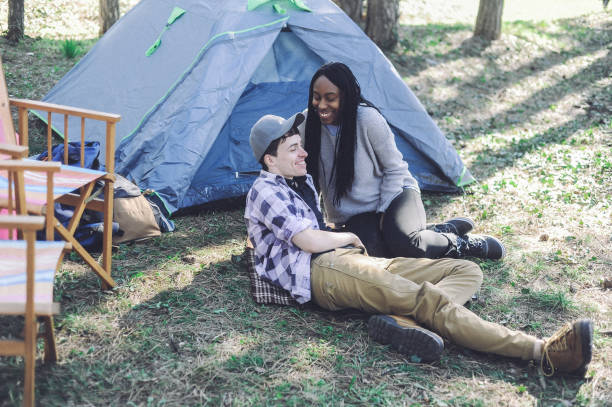 istock Mixed race couple camping 1147942611