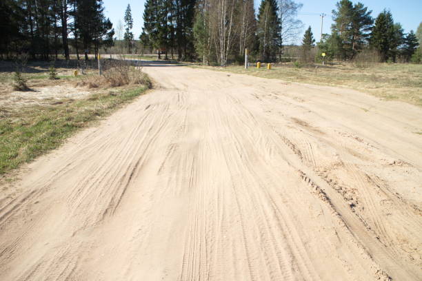 istock Spring country road on a sunny day 1147943921