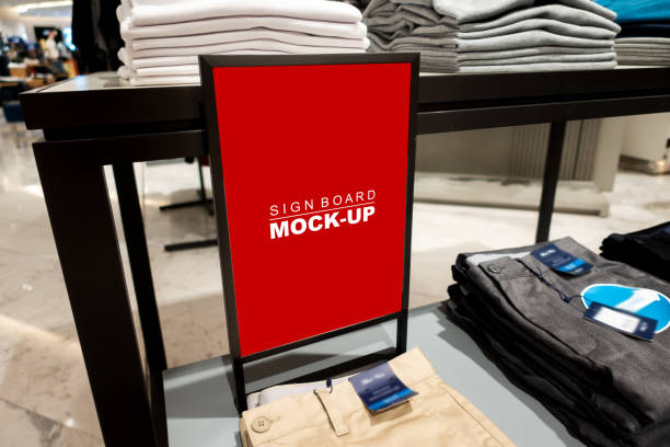 istock Mock up signboard standing on showcased pant shop 1147943937