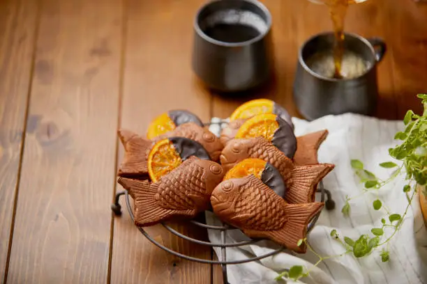 Taiyaki baked with Orangette and pouring coffee.