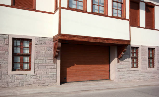 istock automatic wooden entry door 1147944550