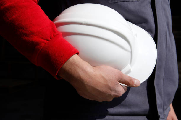 istock production area, helmet and worker 1147946322