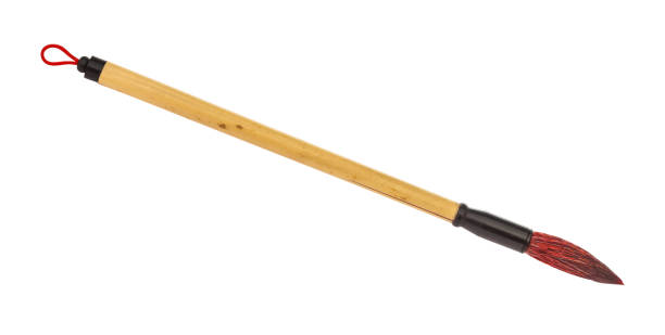 istock bamboo paint brush with red colored tip isolated 1147947487