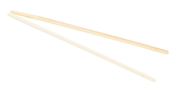 istock carved disposable wooden chopsticks isolated 1147950403