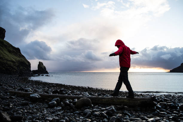 istock Man in Talisker Bay Beach 1147952747
