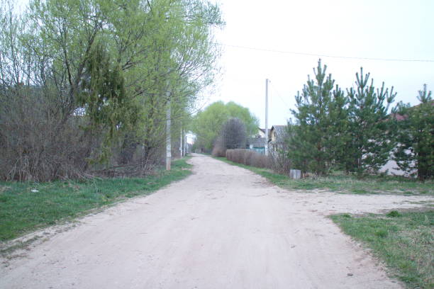 istock Spring country road in the evening 1147953555
