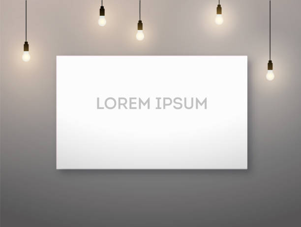 istock A3, A4 horizontal picture frame and light bulb, lamp. warm lighting. Vector realisitc paper or plastic white picture-framing mat with wide borders shadow. 1147954060