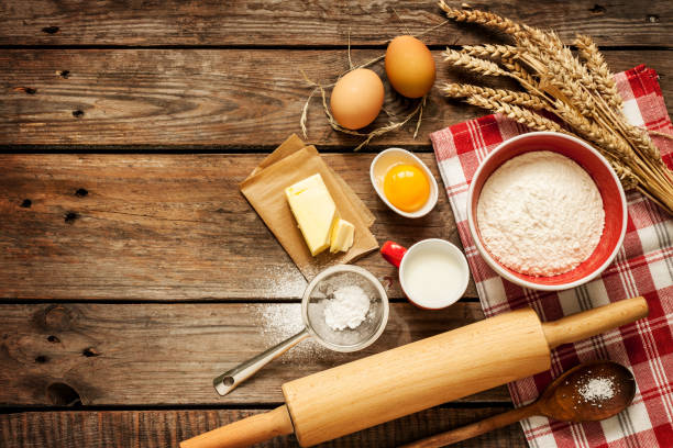 istock Baking cake in rural kitchen - dough recipe ingredients 1147954323