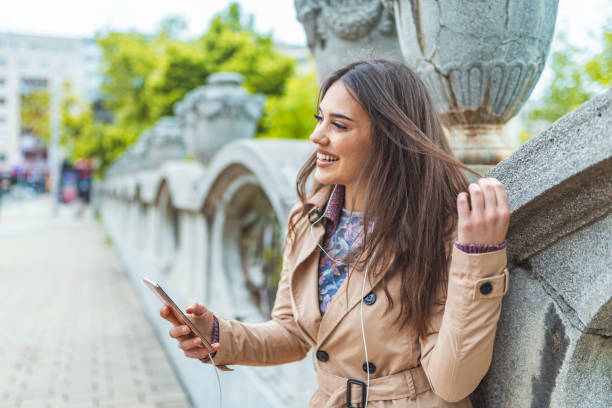 istock Young woman using a smartphone 1147954627