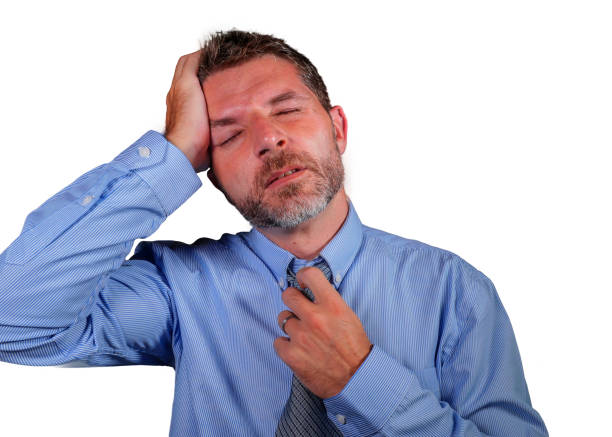 istock Attractive and stressed businessman in shirt and necktie suffering depression problem feeling tired and overwhelmed isolated on white background in company business stress and overwork 1147956906