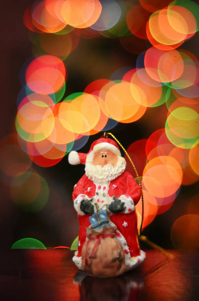 istock Santa Claus on a background of lights 1147958761