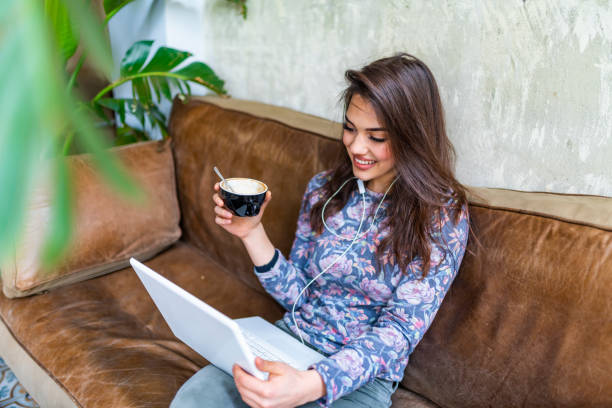 istock Gorgeous cheerful woman freelancer with good mood using laptop computer 1147960189