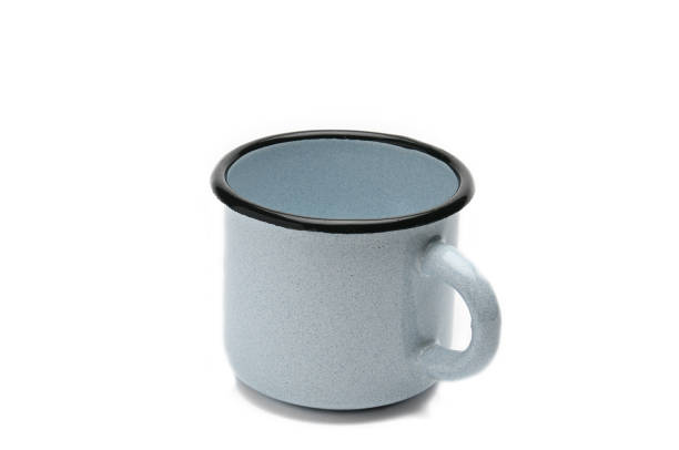 istock Old iron cup on a white background.Blue mug with black border 1147961966