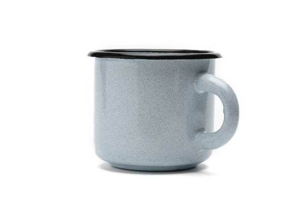 istock Old iron cup on a white background.Blue mug with black border 1147961973