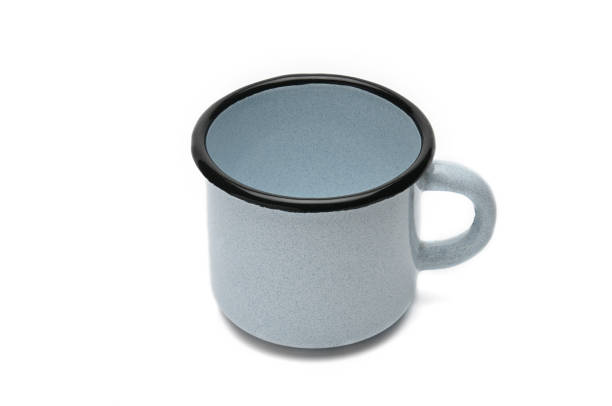istock Old iron cup on a white background.Blue mug with black border 1147961979