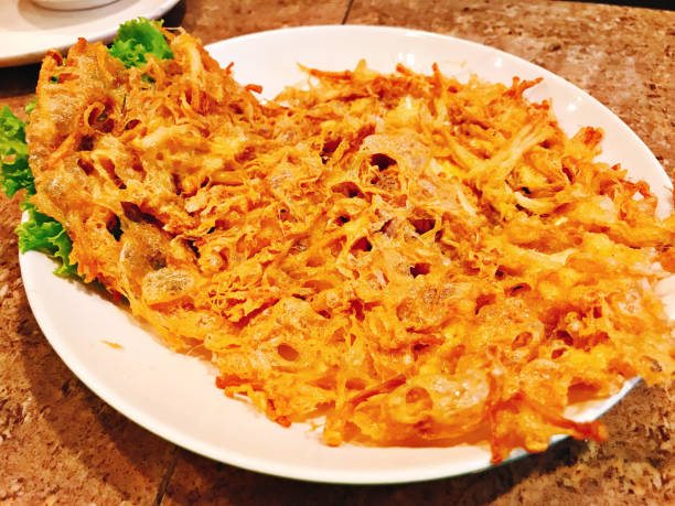 istock Crispy minced pork omelette in Thailand. 1147962229
