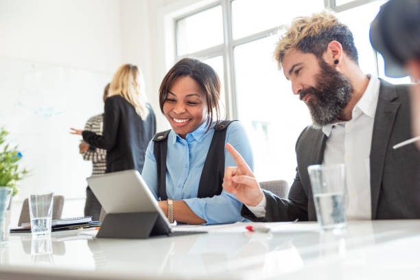 istock Colleagues having a discussion in the office 1147964775